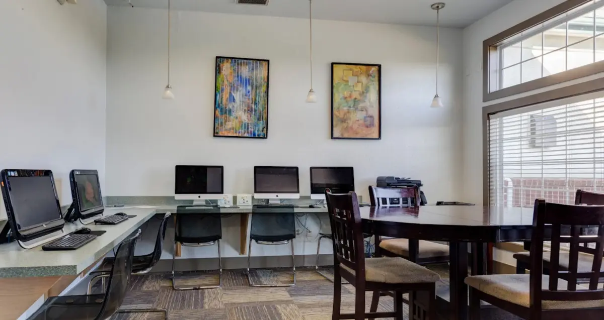 Student study lounge with computers and workspace at The Ridge, apartments near West Virginia University.